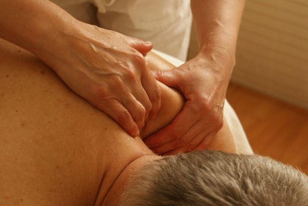 a physiotherapist performing treatment